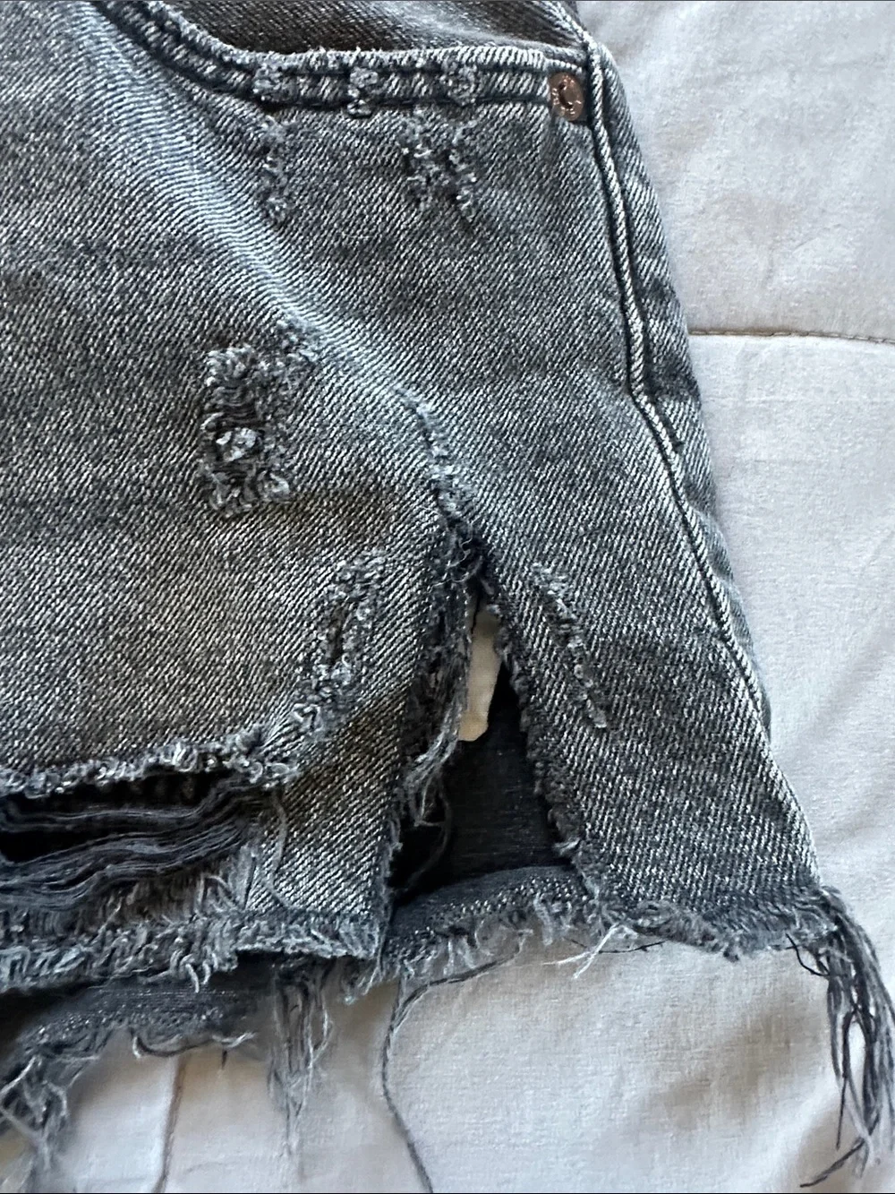 Levi’s Black Distressed Denim Cutoff Shorts